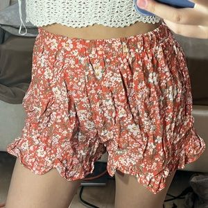 coral floral shorts with frill